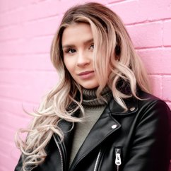 woman-portrait-on-pink-brick