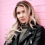 woman-portrait-on-pink-brick